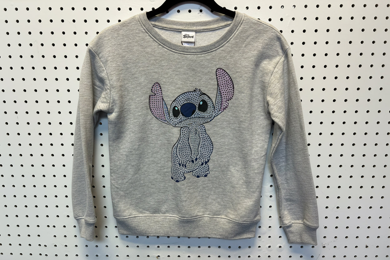 Grey Disney Lilo and Stitch crewneck sweatshirt featuring a sequined graphic of Stitch. Size 10/12