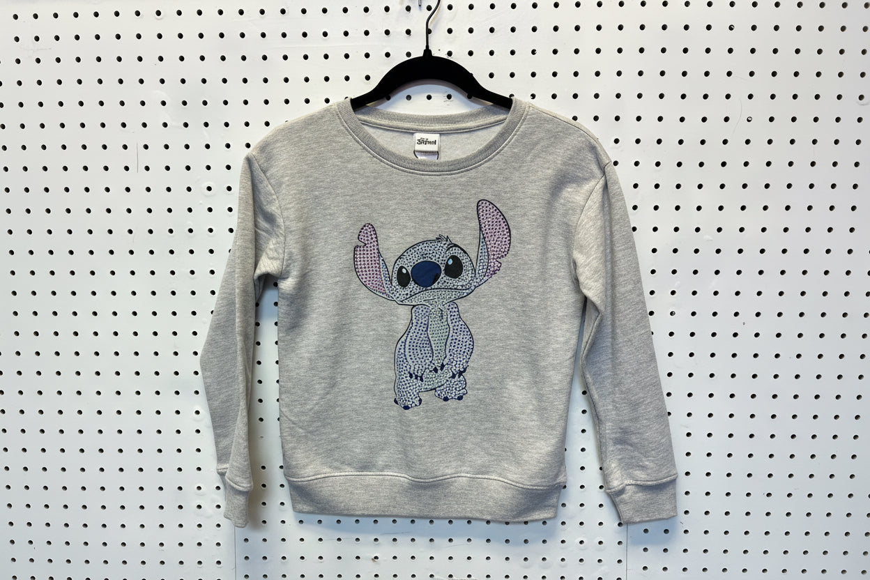 Grey Disney Lilo and Stitch crewneck sweatshirt featuring a sequined graphic of Stitch. Size 10/12